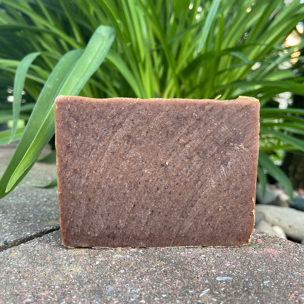 frankincense myrrh soap bar is brown with spots