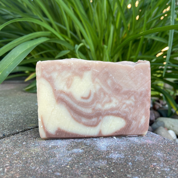 sandalwood soap bar with brown and cream swirls